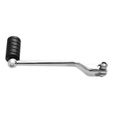 Chrome motorcycle gear shift lever with black rubber grip on white background