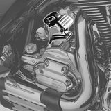 Chrome Harley-Davidson engine cover with custom ribbed detailing on motorcycle engine