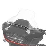 Clear motorcycle windshield on black fairing with dual LED headlights