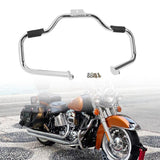 Chrome motorcycle engine guard with mounting hardware shown above a classic cruiser motorcycle
