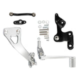 Motorcycle chrome and black rearset kit with mounting hardware on white background