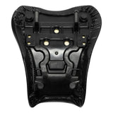 Underside view of black motorcycle seat pan with carbon fiber trim and mounting points