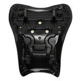 Underside of a black bicycle seat with visible mounting points and plastic base