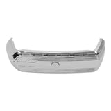 Chrome classic car rear bumper with textured details, isolated on white background