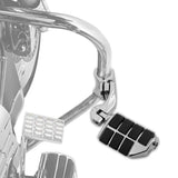 Chrome motorcycle highway foot peg and pedal with black rubber grips mounted on crash bar