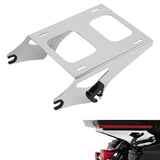 Chrome motorcycle luggage rack mounting bracket installed on rear fender with tail light.