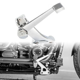 Chrome motorcycle gear shift lever with textured pedal, shown with bike engine background