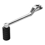 Chrome motorcycle gear shift lever with black rubber foot pad on white background