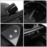 Close-up details of a glossy black salon shampoo bowl with fixtures and drainage.
