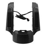 Carbon fiber motorcycle dashboard cover with wiring and textured finish on white background