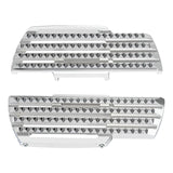 Silver metal custom footpegs with spiked traction for motorcycles on white background