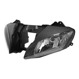 Left side black automotive headlight assembly on white background