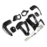 black plastic car bumper parts kit with mounting hardware on white background
