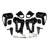 Black ATV plastic fender kit with mounting hardware set, laid out on white background