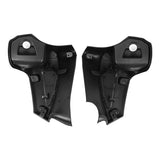 Pair of black motorcycle lower fairing glove box panels on white background