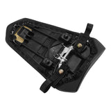 Underside view of black motorcycle seat with mounting hardware and straps