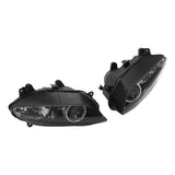 black projector headlights pair for car, automotive headlight assembly on white background