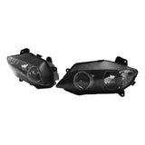 Pair of black projector headlights for car, isolated on white background