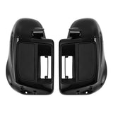 Glossy black motorcycle saddlebags with latch cutouts, side by side on white background