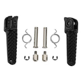 Black motorcycle foot pegs kit with metal pins, springs, and hardware on white background