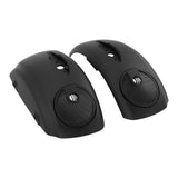 Black motorcycle saddlebag lids with built-in round speakers on white background