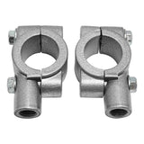 Pair of silver metal mounting clamps with bolts on white background