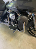 Harley-Davidson touring motorcycle with chrome 114 engine and black fairings