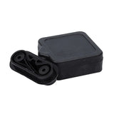 Black rubber exhaust mount bracket with a square shape, auto part on white background