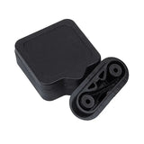 Black rubber brake pad spacer block for bicycle disc brakes on white background